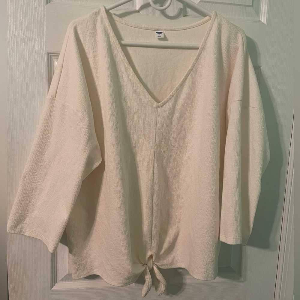 Off white 3/4 length blouse, tie in front. Lightly worn